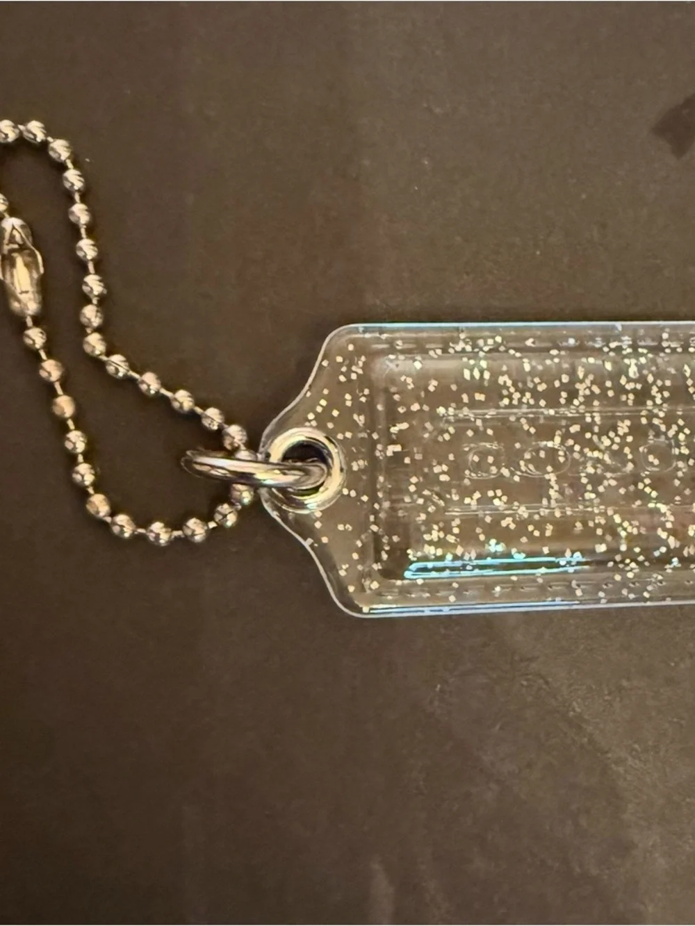 Coach Clear Glitter Tag Phone Charm with Silver Tone Chain